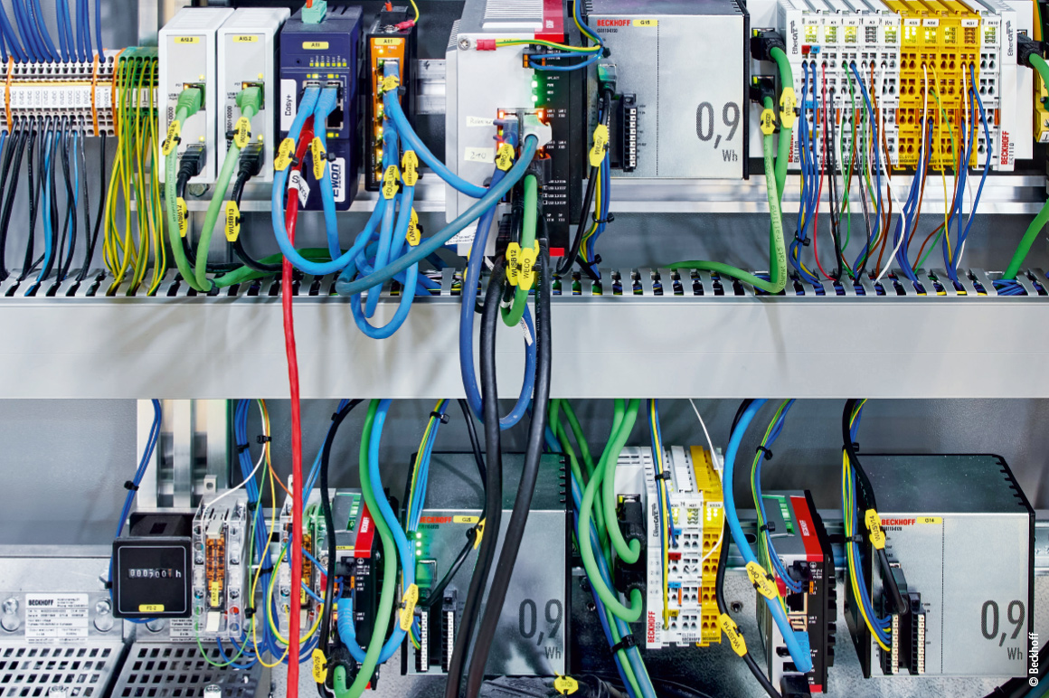 Ultra-compact industrial PCs in the WIRO 500 control cabinet: one C6030 (top) as the central control computer and two C6015s (bottom) as an OPC UA gateway to the higher-level customer system and as a controller for the optional transfer module.