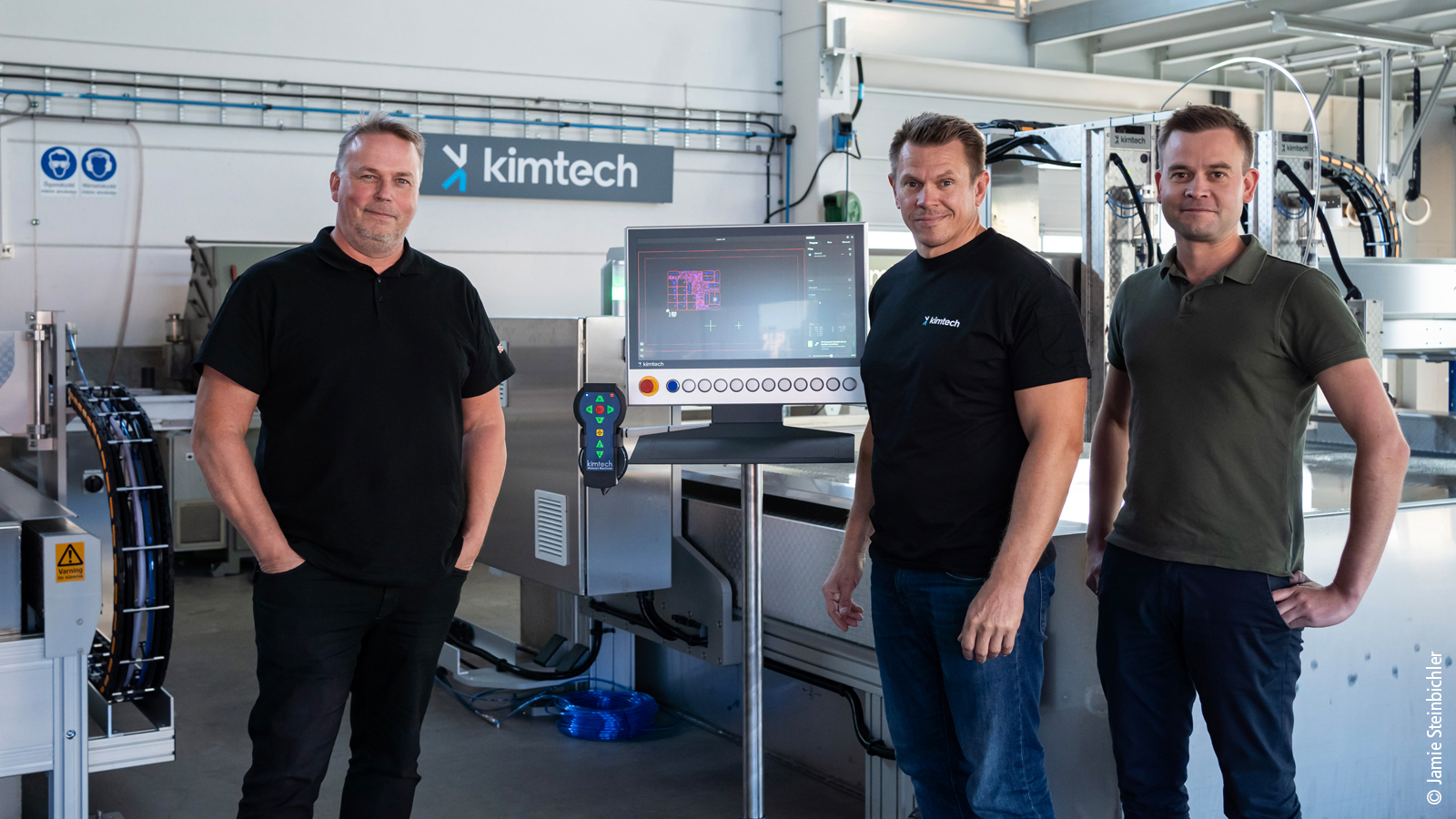 Stefan Hanhela, Senior Sales Specialist Motion at Beckhoff Sweden, together with Kimtech CEO Gustaf Kimblad and Jesper Kimblad from IGEMS (pictured left to right) in front of a waterjet cutting system with a CP3921 stainless steel multi-touch Control Panel providing the HMI.